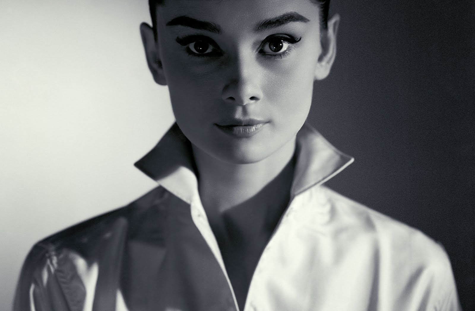 The beauty of a woman is not in a facial mole,but true beauty in a Woman is reflected in her soul. It is the caring that she lovingly gives, the passion that she knows. - Audrey Hepburn